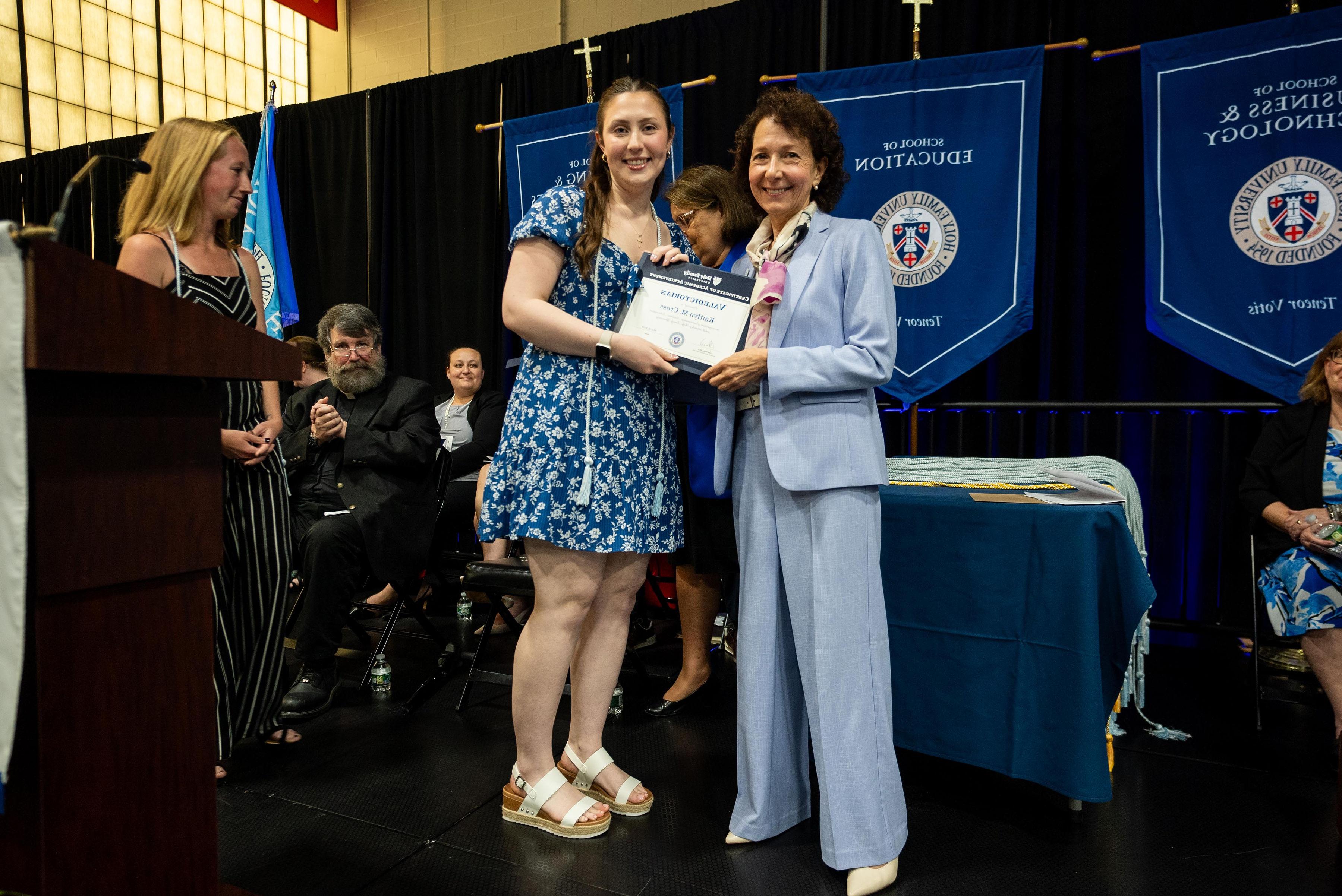 Class of 2024 Valedictorian Kaitlyn Cross with HFU's President Prisco